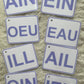 Cartes L'anneau des Sons pour apprentissage lecture avec digrammes et trigrammes en lettres violettes sur fond blanc.