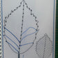 Page du livret de graphisme avec exercice de lignes obliques représentant une feuille à compléter et tracer au feutre effaçable.