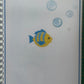 Page du livret de graphisme avec un poisson et des bulles pour exercices de motricité fine maternelle